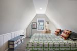 Additional Comfort Awaits Upstairs in the Upper Level Queen Suite`s Inviting Queen Bed